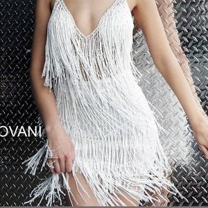(Never been worn // Tags still on) White Flapper Deep V beaded dress by JOVANI